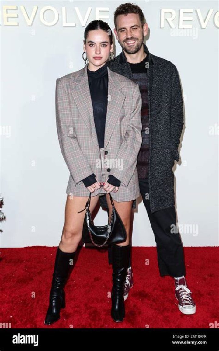 Natalie Joy and boyfriend/American actor, television personality and model Nick Viall arrive at REVOLVE x AT&T Present REVOLVE Winterland held at 55 N La Cienega Boulevard on December 8, 2022 in Beverly Hills, Los Angeles, California, United States.REVOLVE x AT&T Present REVOLVE Winterland, 55 N La Cienega Boulevard, Beverly Hills, Los Angeles, California, United States - 08 Dec 2022