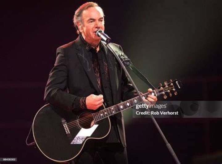 NEIL DIAMOND NEIL DIAMOND PERFORMING AT THE WEMBLEY STADIUM, LONDON, BRITAIN - 1989