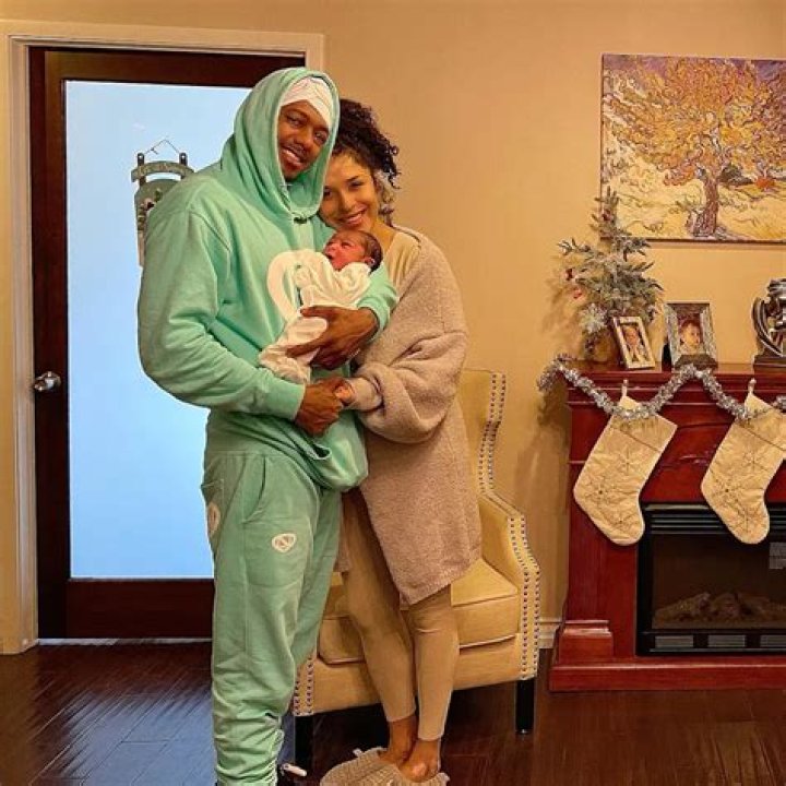 Nick Cannon, Brittany Bell & Kids At A Charity Event