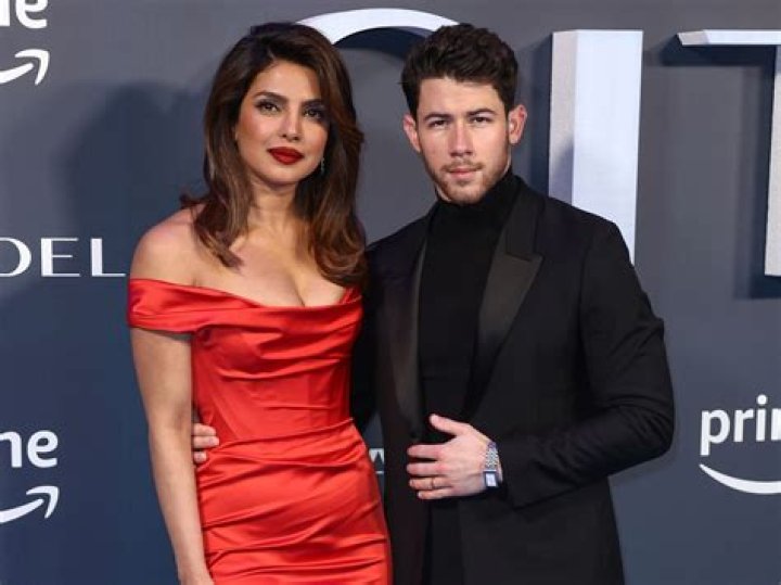 Nick Jonas Is The Perfect Gentleman As He Helps Fix Priyanka Chopra’s Outfit On The Red Carpet