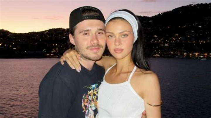 Nicola Peltz and Brooklyn Beckham hold hands on their honeymoon