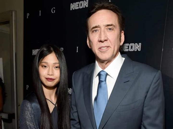 Nicolas Cage, 57, & Wife Riko Shibata, 26, Hold Each Other Close As They Embrace On Magazine Cover