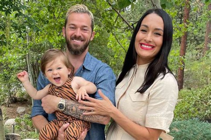 Nikki Bella & Artem Chigvintsev Snuggle Up On Sweet Beach Date With Newborn Son Matteo — Pics