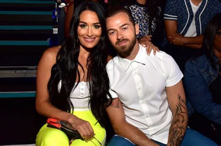 Nikki Bella Puts Her Massive Baby Bump On Display While Dancing Around In Her Old WWE Uniform