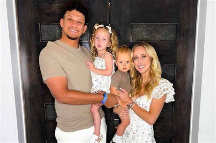 Patrick Mahomes & Brittany Matthews Gush Over Baby Girl Sterling As She Cuddles With Family Dog