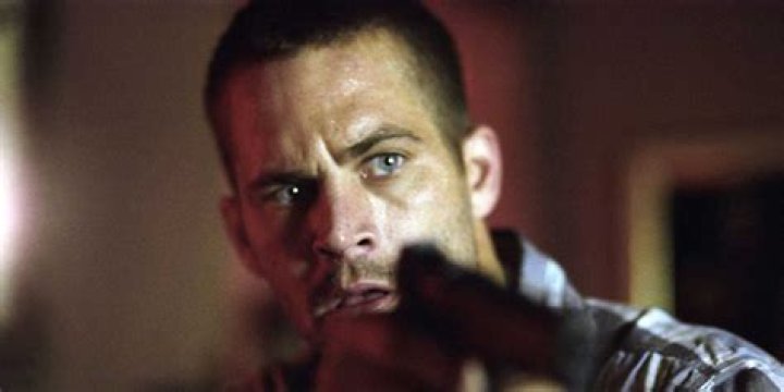 Paul Walker Points a Gun in &lsquo;Brick Mansions&rsquo;