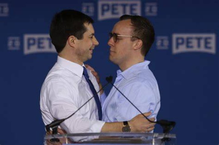 Pete Buttigieg, Chasten Glezman. Democratic presidential candidate former South Bend, Ind., Mayor Pete Buttigieg, left, is joined by his husband Chasten Glezman after speaking to supporters at a caucus night rally in Des Moines, IowaElection 2020 Pete Buttigieg, Des Moines, USA - 03 Feb 2020
