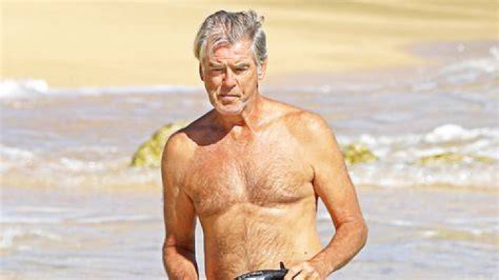 Pierce Brosnan, 67, Emerges From The Ocean Shirtless & Looks Ready To Reprise His ‘James Bond’ Role