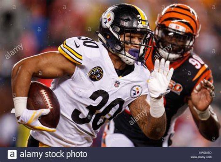 Pittsburgh Steelers running back James Conner (30) celebrates his touchdown during the second half of an NFL football game against the Buffalo Bills in Pittsburgh Bills Steelers Football, Pittsburgh, USA - 15 Dec 2019