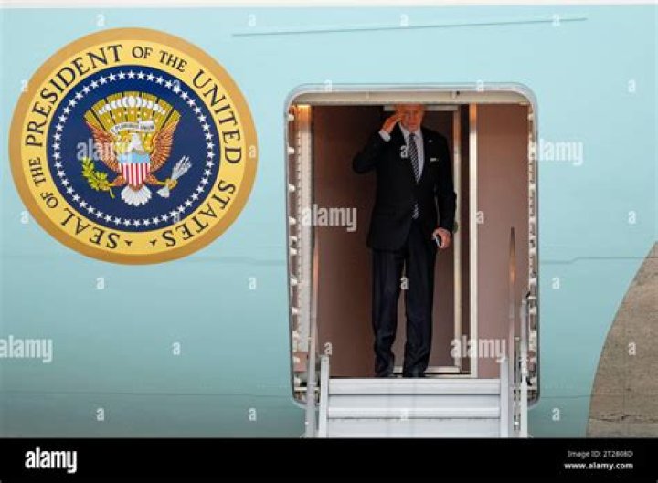 President Joe Biden salutes as he and first lady Jill Biden board Air Force One for a trip to Georgia to mark his 100th day in office, in Andrews Air Force Base, Md Biden, Andrews Air Force Base, United States - 29 Apr 2021