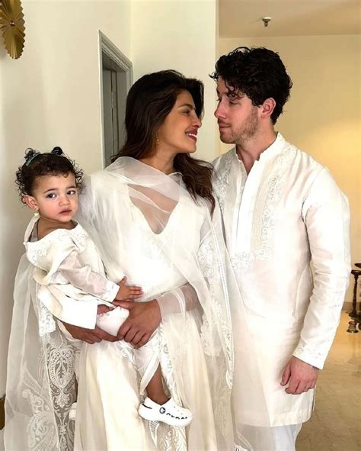 Priyanka Chopra Reunites With Daughter, 10 Mos., & Nick Jonas In Adorable Family Photo After India Trip