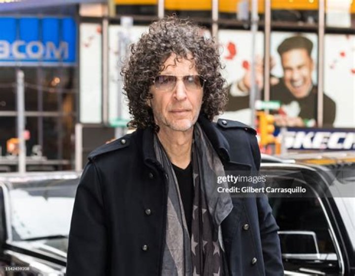 Radio and television personality Howard Stern, left, and his wife, fashion model Beth Ostrosky Stern, right, attend a screening of "The Secret Life of Walter Mitty" presented by 20th Century Fox with the Cinema Society & Brooks Brothers, in New York NY Special Screening of The Secret Life of Walter Mitty, New York, USA