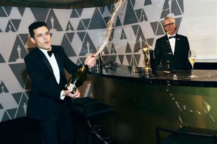 Rami Malek Popping Champagne