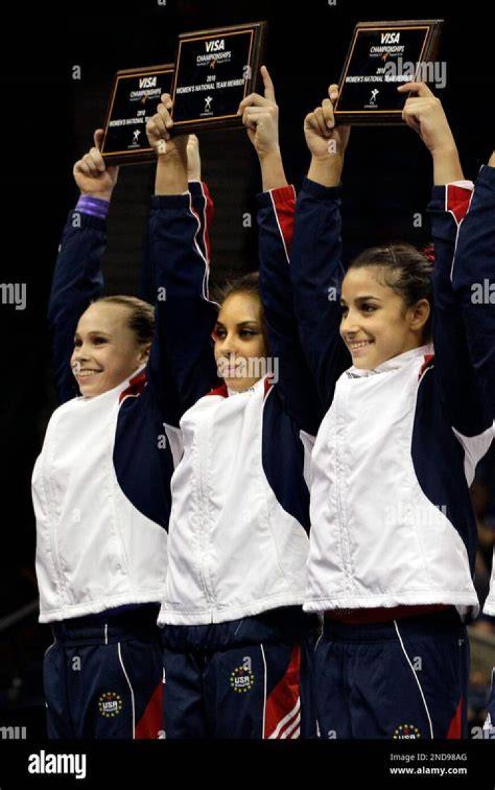 Rebecca Bross, Mattie Larson, Alexandra Raisman From left to right, gold medalist Rebecca Bross, silver medalist Mattie Larson, and bronze medalist Alexandra Raisman of the all-around in the women's senior division, stand before the crowd at the U.S. Gymnastics Championships in Hartford, Conn US Gymnastics Championships, Hartford, USA