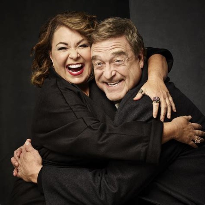 Roseanne Barr and John Goodman taking promotional photos for &lsquo;Roseanne&rsquo;