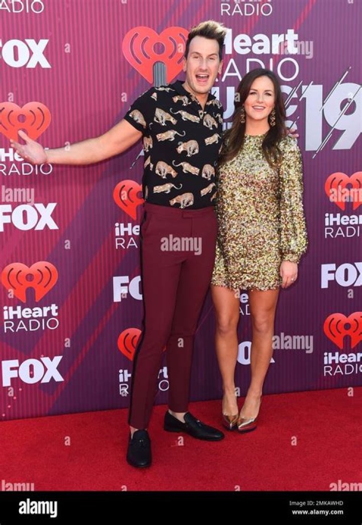 Russell Dickerson, left, and Kailey Dickerson arrive at the 53rd annual CMA Awards at Bridgestone Arena on Wednesday, Nov. 13, 2019, in Nashville, Tenn. (Photo by Evan Agostini/Invision/AP)
