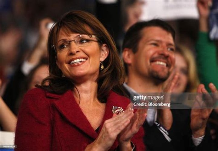 Sarah Palin Former Republican vice presidential candidate and Alaska Gov. Sarah Palin waves to supporters before addressing a Tea Partly Express Rally in Manchester, N.H. Palin's husband Todd, released a statement, responding to Joe McGinniss' "The Rogue: Searching for the Real Sarah Palin," as "disgusting lies, innuendo and smears" as the former Alaska governor's camp sought to discredit a racy biography that includes allegations of infidelity and drug use Palin-Book, Manchester, USA