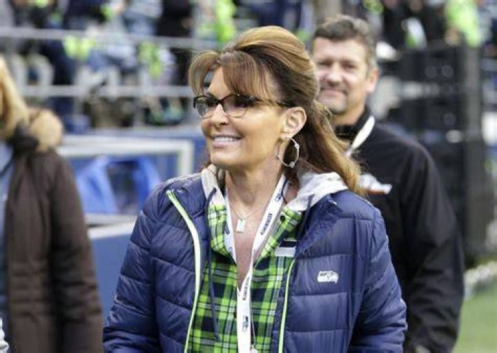 Sarah Palin, political commentator and former governor of Alaska, walks on the sideline before an NFL football game between the Seattle Seahawks and the Los Angeles Rams, in Seattle Los Angeles Rams v Seattle Seahawks, NFL football game, Seattle, USA - 15 Dec 2016