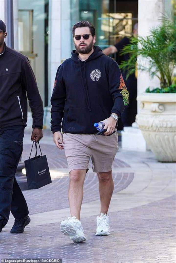 Scott Disick looks relaxed as he spends time with his 3 children on the beach in Miami. 22 Feb 2022 Pictured: Scott Disick, Mason Disick, Penelope Disick, Reign Disick. Photo credit: MEGA TheMegaAgency.com +1 888 505 6342 (Mega Agency TagID: MEGA830586_002.jpg) [Photo via Mega Agency]