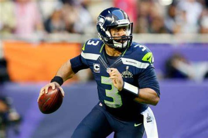 Seattle Seahawks quarterback Russell Wilson watches from the bench during the second half of an NFL preseason football game against the Minnesota Vikings, in Minneapolis Seahawks Vikings Football, Minneapolis, USA - 18 Aug 2019