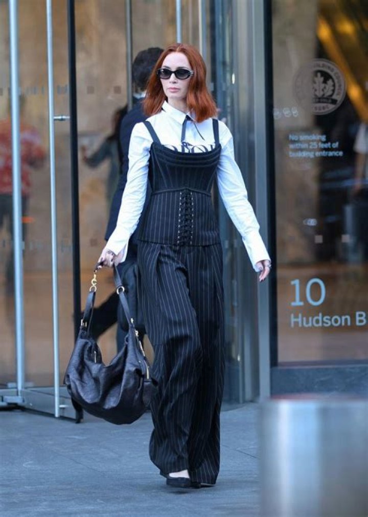 Sharna Burgess wears a pinstripe suit