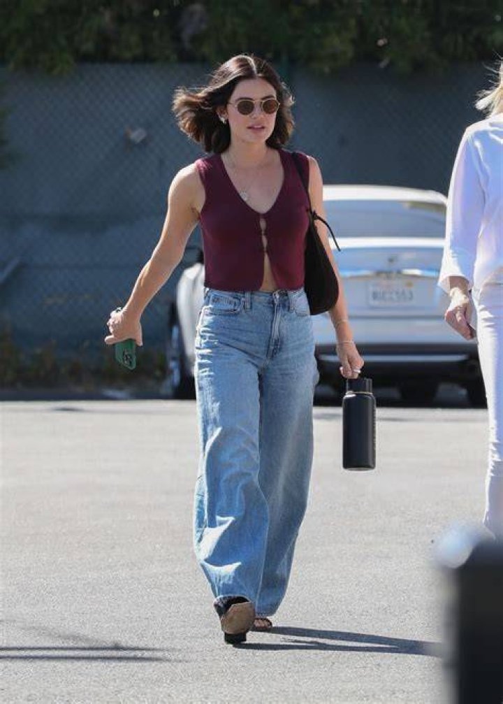 She Stuns In Maroon Coat – Hollywood Life
