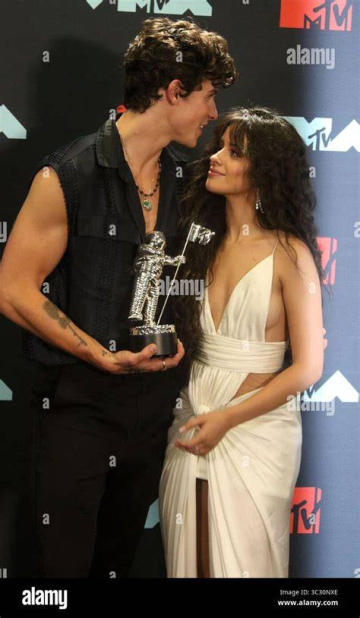 Singers Shawn Mendes and Camila Cabello are seen kissing in Miami Beach. Pictured: Camila Cabello,Shawn Mendes Ref: SPL5106592 290719 NON-EXCLUSIVE Picture by: RM / SplashNews.com Splash News and Pictures USA: +1 310-525-5808 London: +44 (0)20 8126 1009 Berlin: +49 175 3764 166 World Rights