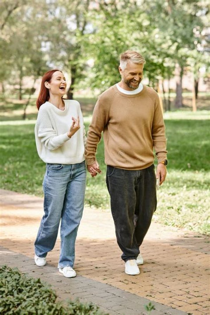Smiles On A Sidewalk Stroll
