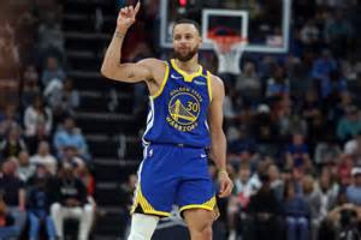 Steph Curry goes for a block