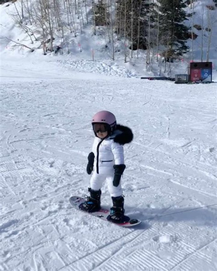 Stormi Webster take snowboarding lessons