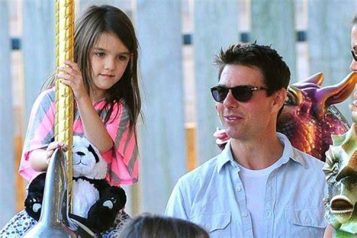 Suri Cruise Dons a Bright Yellow Sweatshirt