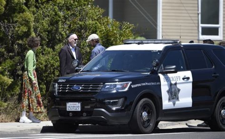 Synagogue members stand outside of the Chabad of Poway Synagogue, in Poway, Calif. Several people were injured in a shooting at the synagogue Synagogue Shooting-California, Poway, USA - 27 Apr 2019