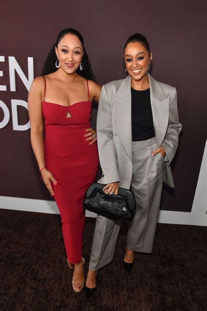 Tamera Mowry, left, and Tia Mowry arrive at the Teen Choice Awards at the Gibson Amphitheater, in Los Angeles 2013 Teen Choice Awards - Arrivals, Los Angeles, USA - 11 Aug 2013