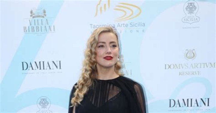 Taormina, ITALY - Actress Amber Heard greets fans while promoting her new film "In the Fire" at the 69th Taormina Film Festival. Pictured: Amber Heard BACKGRID USA 24 JUNE 2023 BYLINE MUST READ: Cobra Team / BACKGRID USA: +1 310 798 9111 / UK: +44 208 344 2007 / *UK Clients - Pictures Containing Children Please Pixelate Face Prior To Publication*