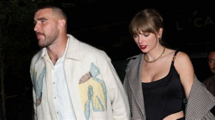Taylor Swift References Travis Kelce Kiss in Instagram Message – Hollywood Life