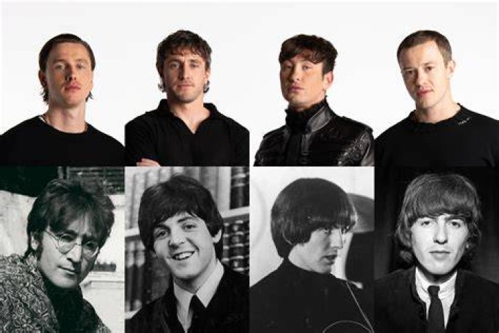 The Beatles smile for a pic