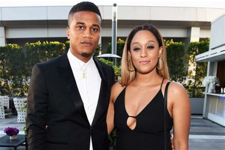 Tia Mowry and Cory Hardrict grab their food to go after attending a house party in Los Angeles. 08 Dec 2019 Pictured: Tia Mowry and Cory Hardrict. Photo credit: Photographer Group/MEGA TheMegaAgency.com +1 888 505 6342 (Mega Agency TagID: MEGA564211_002.jpg) [Photo via Mega Agency]