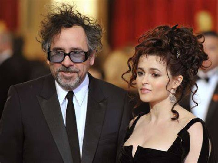 Tim Burton, Helena Bonham-Carter Filmmaker Tim Burton, left, and his wife Helena Bonham-Carter, pose as they arrive for the opening of his exhibition, a retrospective of his work, in ParisFrance Tim Burton, Paris, France