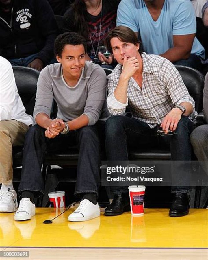 Tom Cruise and Connor Cruise at basketball game.