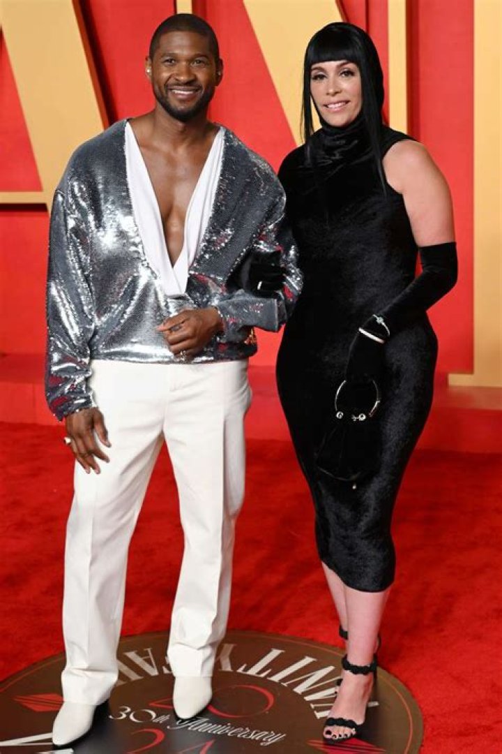 Usher and Jennifer Goicoechea