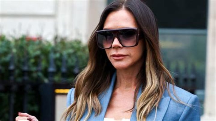 Victoria Beckham looks radiant in a blue metallic dress and glittering boots while returning back to her hotel in New York City Pictured: Victoria Beckham Ref: SPL5494302 121022 NON-EXCLUSIVE Picture by: Felipe Ramales / SplashNews.com Splash News and Pictures USA: +1 310-525-5808 London: +44 (0)20 8126 1009 Berlin: +49 175 3764 166 World Rights