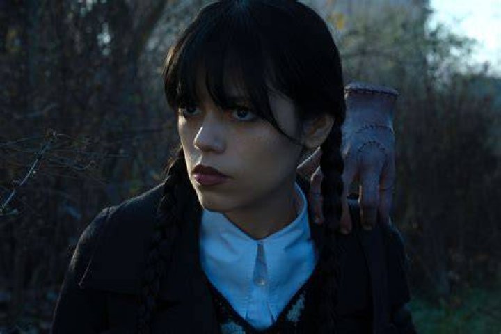 Wednesday. (L to R) Jenna Ortega as Wednesday Addams, Percy Hynes White as Xavier Thorpe in episode 101 of Wednesday. Cr. Vlad Cioplea/Netflix &copy; 2022