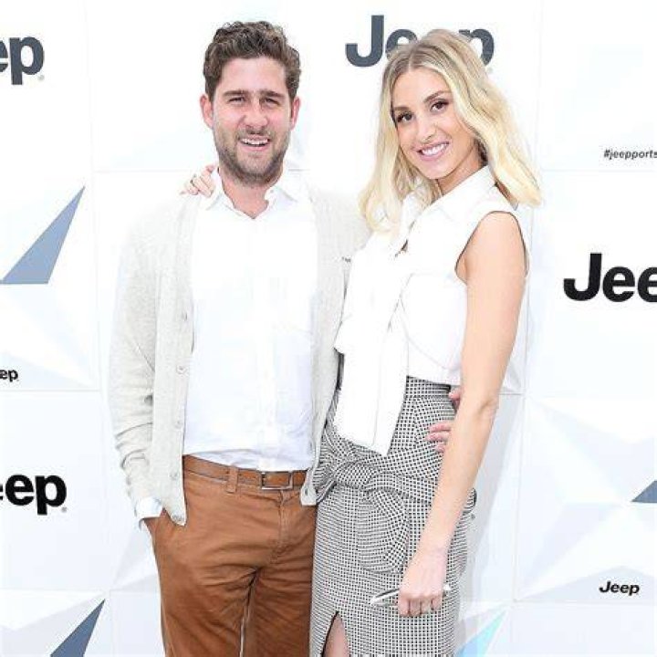 Whitney Port poses with husband, Tim and 2 year old son, Sonny