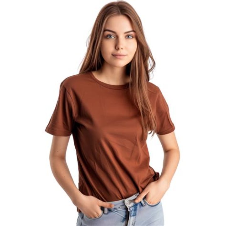 Woman wearing a brown and white stripped tie-front t-shirt dress